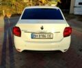 Белый Рено Логан, объемом двигателя 1 л и пробегом 300 тыс. км за 4000 $, фото 3 на Automoto.ua