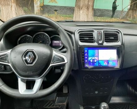 Белый Рено Логан, объемом двигателя 1 л и пробегом 140 тыс. км за 6200 $, фото 8 на Automoto.ua