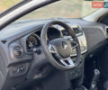 Білий Рено Логан, об'ємом двигуна 1 л та пробігом 255 тис. км за 4200 $, фото 3 на Automoto.ua