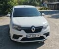 Белый Рено Логан, объемом двигателя 1 л и пробегом 258 тыс. км за 6424 $, фото 1 на Automoto.ua