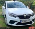 Белый Рено Логан, объемом двигателя 1 л и пробегом 157 тыс. км за 6700 $, фото 1 на Automoto.ua
