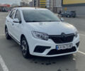 Белый Рено Логан, объемом двигателя 1 л и пробегом 157 тыс. км за 6600 $, фото 1 на Automoto.ua