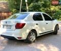 Белый Рено Логан, объемом двигателя 1 л и пробегом 310 тыс. км за 3950 $, фото 1 на Automoto.ua