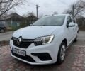 Білий Рено Логан, об'ємом двигуна 1 л та пробігом 130 тис. км за 4899 $, фото 1 на Automoto.ua