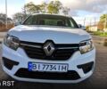 Белый Рено Логан, объемом двигателя 1 л и пробегом 200 тыс. км за 3700 $, фото 1 на Automoto.ua