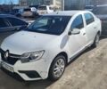 Белый Рено Логан, объемом двигателя 1 л и пробегом 206 тыс. км за 3999 $, фото 1 на Automoto.ua