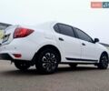 Белый Рено Логан, объемом двигателя 1.5 л и пробегом 150 тыс. км за 9150 $, фото 3 на Automoto.ua
