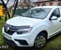 Белый Рено Логан, объемом двигателя 1 л и пробегом 169 тыс. км за 4950 $, фото 1 на Automoto.ua