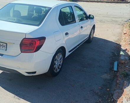 Белый Рено Логан, объемом двигателя 1 л и пробегом 282 тыс. км за 3750 $, фото 3 на Automoto.ua