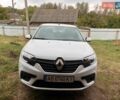Белый Рено Логан, объемом двигателя 1 л и пробегом 106 тыс. км за 7000 $, фото 1 на Automoto.ua
