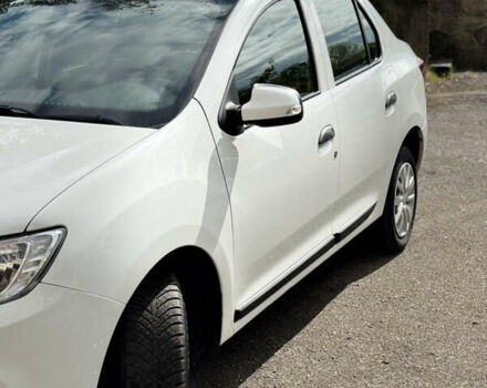 Белый Рено Логан, объемом двигателя 1 л и пробегом 220 тыс. км за 5850 $, фото 3 на Automoto.ua