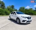 Білий Рено Логан, об'ємом двигуна 1 л та пробігом 143 тис. км за 5800 $, фото 1 на Automoto.ua