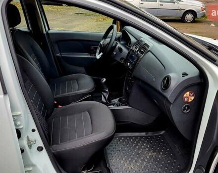 Білий Рено Логан, об'ємом двигуна 1.46 л та пробігом 80 тис. км за 8700 $, фото 25 на Automoto.ua