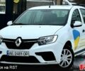 Білий Рено Логан, об'ємом двигуна 1 л та пробігом 320 тис. км за 4200 $, фото 1 на Automoto.ua