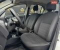 Белый Рено Логан, объемом двигателя 1 л и пробегом 117 тыс. км за 6999 $, фото 6 на Automoto.ua