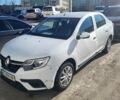 Білий Рено Логан, об'ємом двигуна 1 л та пробігом 197 тис. км за 5600 $, фото 1 на Automoto.ua