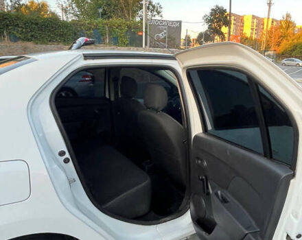 Білий Рено Логан, об'ємом двигуна 1 л та пробігом 79 тис. км за 7400 $, фото 8 на Automoto.ua
