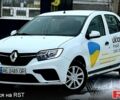 Білий Рено Логан, об'ємом двигуна 1 л та пробігом 320 тис. км за 4200 $, фото 2 на Automoto.ua