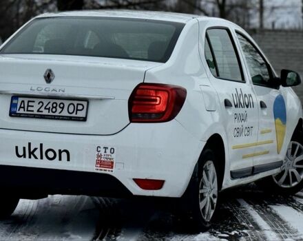 Білий Рено Логан, об'ємом двигуна 1 л та пробігом 330 тис. км за 4200 $, фото 3 на Automoto.ua