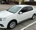 Білий Рено Логан, об'ємом двигуна 1.5 л та пробігом 128 тис. км за 7999 $, фото 1 на Automoto.ua