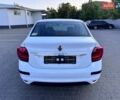 Белый Рено Логан, объемом двигателя 1 л и пробегом 105 тыс. км за 6900 $, фото 2 на Automoto.ua