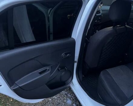 Білий Рено Логан, об'ємом двигуна 1 л та пробігом 99 тис. км за 8150 $, фото 8 на Automoto.ua