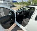 Белый Рено Логан, объемом двигателя 1.5 л и пробегом 140 тыс. км за 9000 $, фото 5 на Automoto.ua