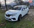 Білий Рено Логан, об'ємом двигуна 1 л та пробігом 99 тис. км за 8150 $, фото 1 на Automoto.ua