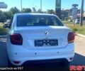 Білий Рено Логан, об'ємом двигуна 1.5 л та пробігом 27 тис. км за 12950 $, фото 1 на Automoto.ua