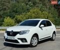 Белый Рено Логан, объемом двигателя 1.46 л и пробегом 57 тыс. км за 9999 $, фото 1 на Automoto.ua