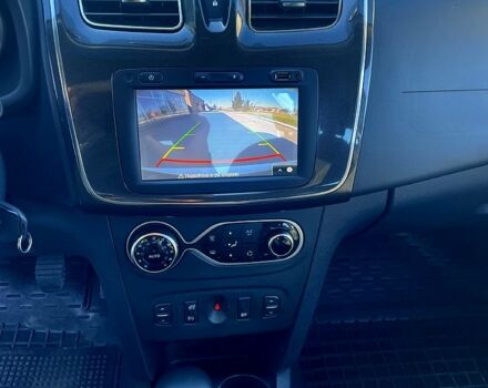 Білий Рено Логан, об'ємом двигуна 1.5 л та пробігом 27 тис. км за 12950 $, фото 7 на Automoto.ua