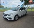 Белый Рено Логан, объемом двигателя 1 л и пробегом 180 тыс. км за 5900 $, фото 1 на Automoto.ua