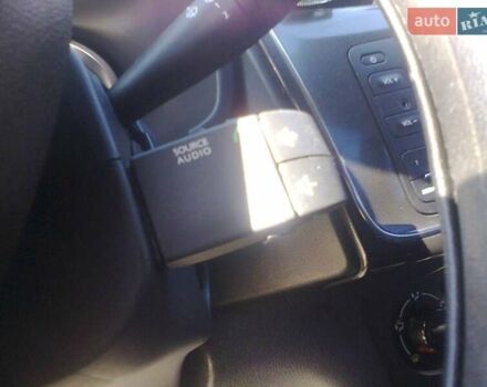 Білий Рено Логан, об'ємом двигуна 1 л та пробігом 70 тис. км за 8899 $, фото 1 на Automoto.ua