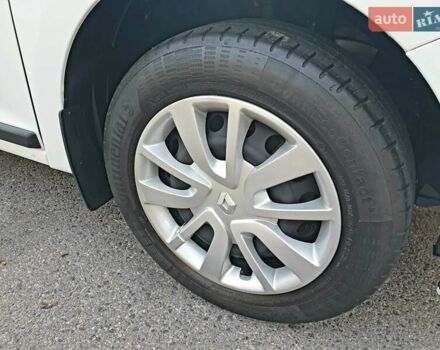 Белый Рено Логан, объемом двигателя 1 л и пробегом 52 тыс. км за 8500 $, фото 24 на Automoto.ua