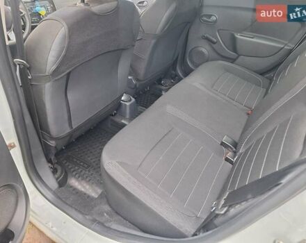 Білий Рено Логан, об'ємом двигуна 1.46 л та пробігом 17 тис. км за 13000 $, фото 18 на Automoto.ua
