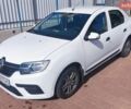 Білий Рено Логан, об'ємом двигуна 1 л та пробігом 65 тис. км за 12500 $, фото 1 на Automoto.ua