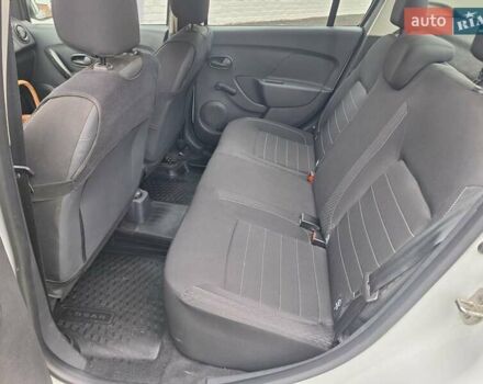 Білий Рено Логан, об'ємом двигуна 1.46 л та пробігом 17 тис. км за 13000 $, фото 17 на Automoto.ua