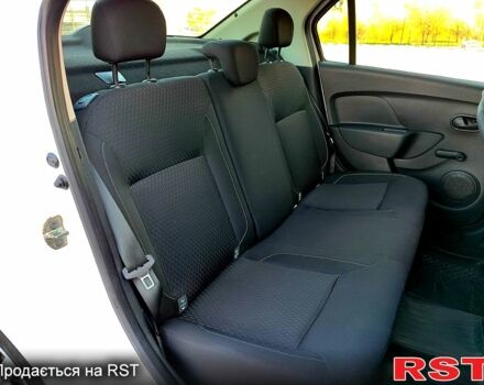 Белый Рено Логан, объемом двигателя 1.5 л и пробегом 38 тыс. км за 9800 $, фото 13 на Automoto.ua