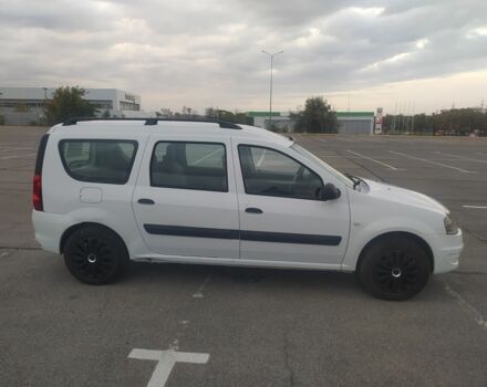 Белый Рено Логан, объемом двигателя 1.5 л и пробегом 247 тыс. км за 4000 $, фото 2 на Automoto.ua