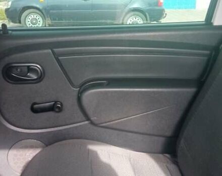 Білий Рено Логан, об'ємом двигуна 1.6 л та пробігом 184 тис. км за 6000 $, фото 23 на Automoto.ua