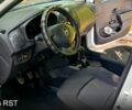 Білий Рено Логан, об'ємом двигуна 1.1 л та пробігом 178 тис. км за 4100 $, фото 3 на Automoto.ua