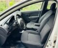 Белый Рено Логан, объемом двигателя 1.2 л и пробегом 225 тыс. км за 4707 $, фото 16 на Automoto.ua