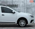 Білий Рено Логан, об'ємом двигуна 1.46 л та пробігом 190 тис. км за 7700 $, фото 7 на Automoto.ua
