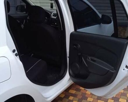 Білий Рено Логан, об'ємом двигуна 1.5 л та пробігом 60 тис. км за 12500 $, фото 8 на Automoto.ua