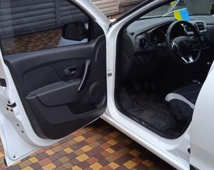 Білий Рено Логан, об'ємом двигуна 1.5 л та пробігом 60 тис. км за 12500 $, фото 11 на Automoto.ua