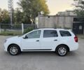 Білий Рено Логан, об'ємом двигуна 1.5 л та пробігом 69 тис. км за 9326 $, фото 1 на Automoto.ua