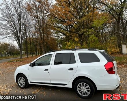 Белый Рено Логан, объемом двигателя 1.5 л и пробегом 73 тыс. км за 10300 $, фото 4 на Automoto.ua