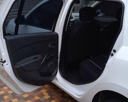 Білий Рено Логан, об'ємом двигуна 1.5 л та пробігом 60 тис. км за 12500 $, фото 10 на Automoto.ua