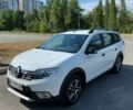 Белый Рено Логан, объемом двигателя 0.9 л и пробегом 142 тыс. км за 11900 $, фото 1 на Automoto.ua