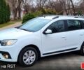 Білий Рено Логан, об'ємом двигуна 1.5 л та пробігом 64 тис. км за 10800 $, фото 1 на Automoto.ua